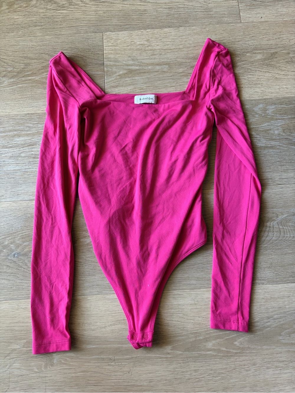 Babaton Long Sleeve One-Piece Bodysuit in Hot Pink